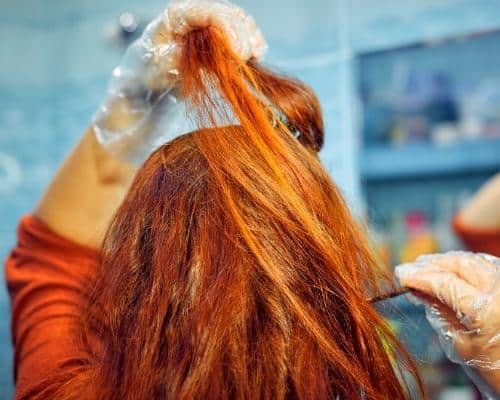 How long to leave henna on hair for red?